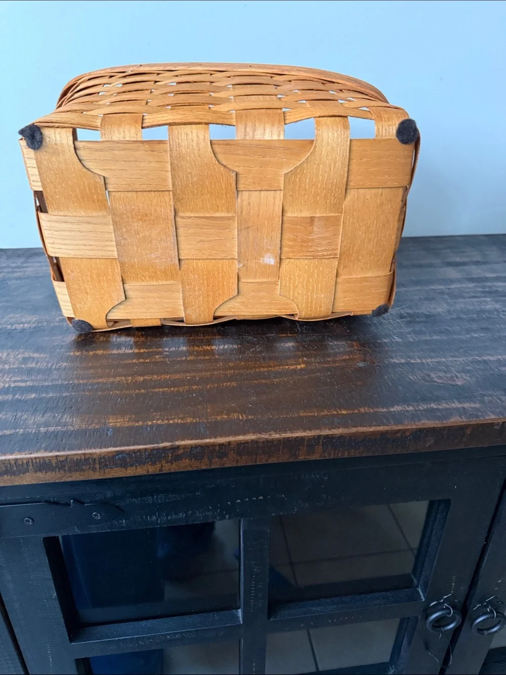 Handwoven Orange Storage Basket with Metal Badge